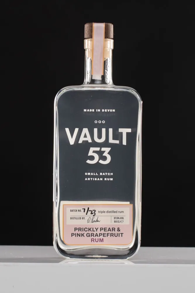 A bottle of Vault 53 prickly pear and pink grapefruit rum